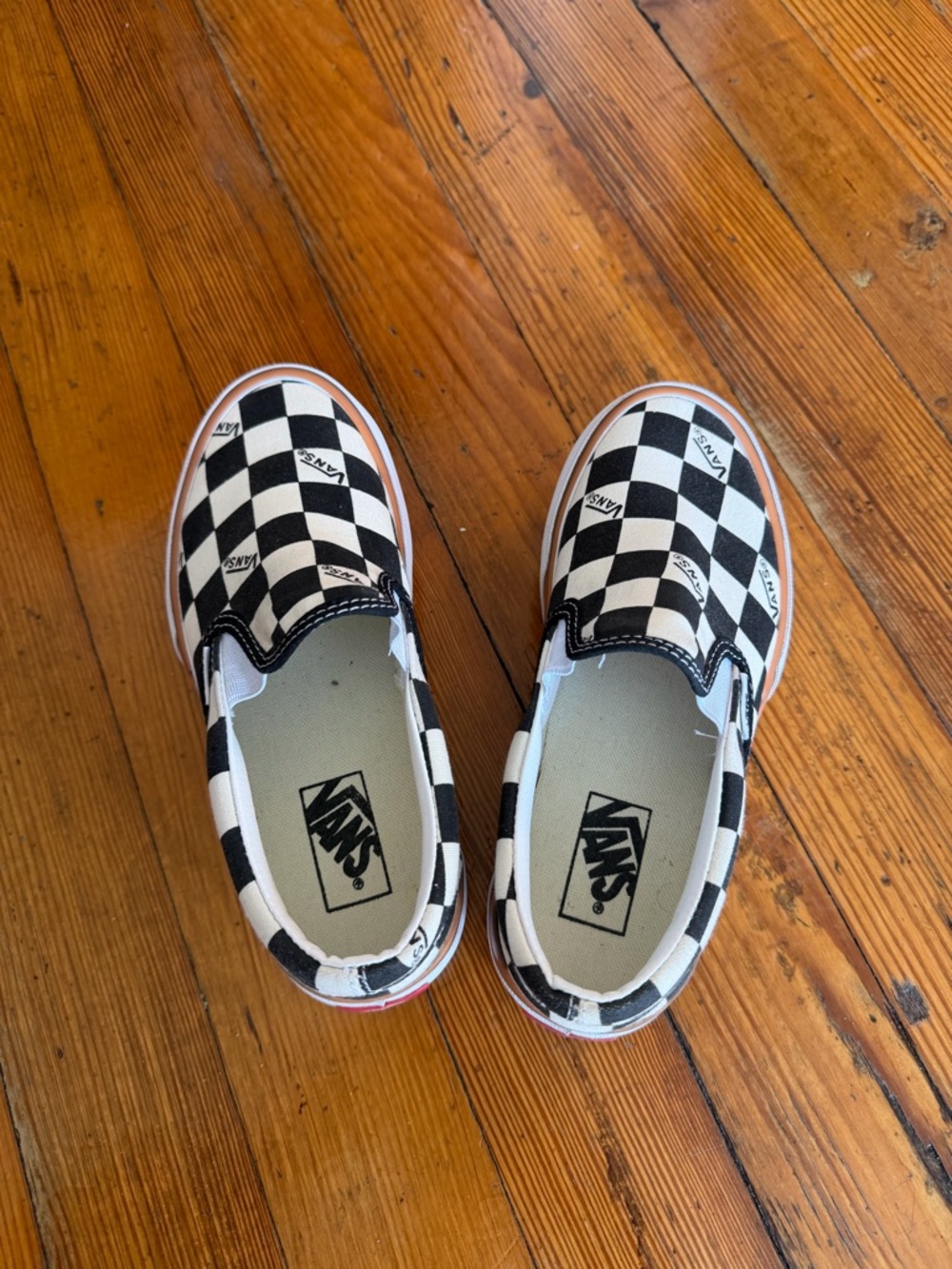 Vans Slip-On Sneakers in Black and White Checkerboard